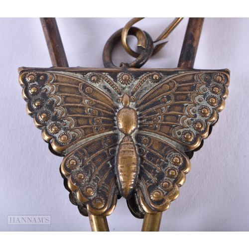 344 - A RARE PAIR OF VICTORIAN EXTENDING BUTTERFLY SKIRT LIFTERS. 15 cm x 6 cm not inc rope.