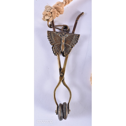 344 - A RARE PAIR OF VICTORIAN EXTENDING BUTTERFLY SKIRT LIFTERS. 15 cm x 6 cm not inc rope.