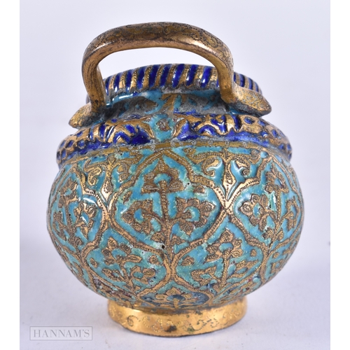 375 - AN UNUSUAL 19TH CENTURY ISLAMIC INDIAN ENAMELLED BRONZE CAULDRON decorated with foliage. 7.25cm high... 