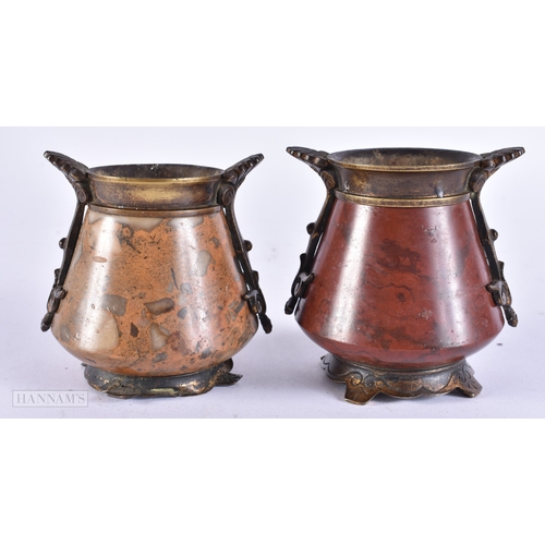 376 - AN UNUSUAL PAIR OF 19TH CENTURY GRAND TOUR BRONZE AND POLISHED STONE VASES. 8 cm x 6 cm.