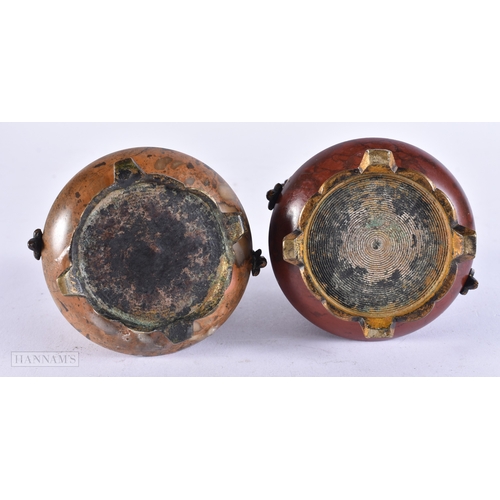 376 - AN UNUSUAL PAIR OF 19TH CENTURY GRAND TOUR BRONZE AND POLISHED STONE VASES. 8 cm x 6 cm.