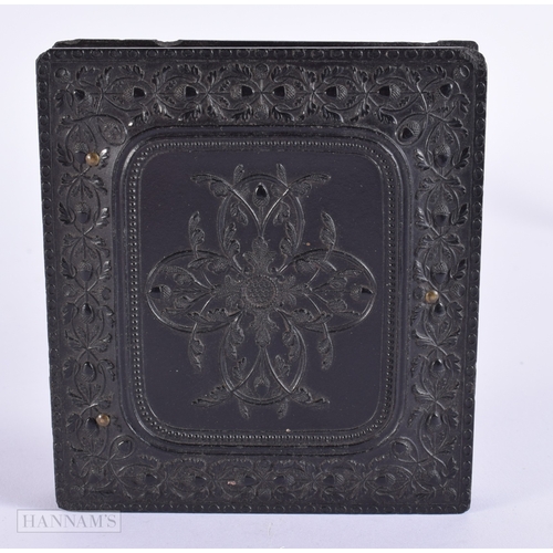 401 - A 19TH CENTURY DAGUERREOTYPE PHOTOGRAPH the case decorated with a central motif flanked by floral sc... 