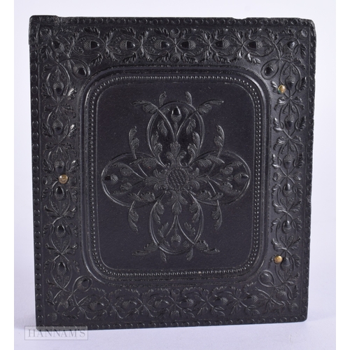 401 - A 19TH CENTURY DAGUERREOTYPE PHOTOGRAPH the case decorated with a central motif flanked by floral sc... 