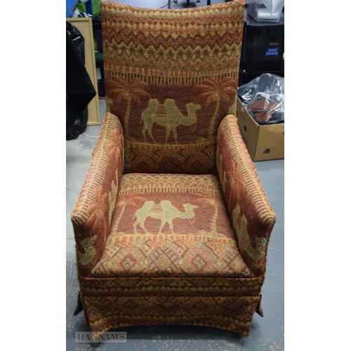 406 - AN UNUSUAL EARLY 20TH CENTURY COUNTRY HOUSE UPHOLSTERED DEEP CHAIR decorated with camels and Eastern... 