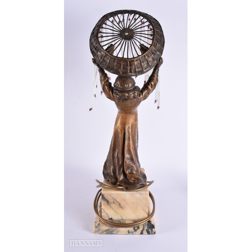 409 - A LOVELY UNUSUAL ART DECO GILT BRONZE FIGURAL LAMP modelled as a female holding aloft a shade with h... 