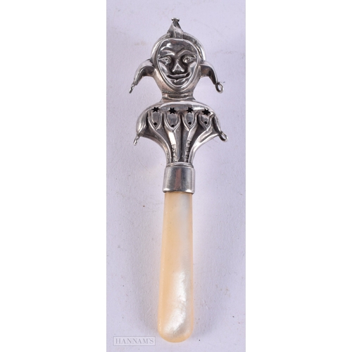 415 - AN ANTIQUE ENGLISH SILVER AND MOTHER OF PEARL JESTER BABIES RATTLE. 11.5 cm long.