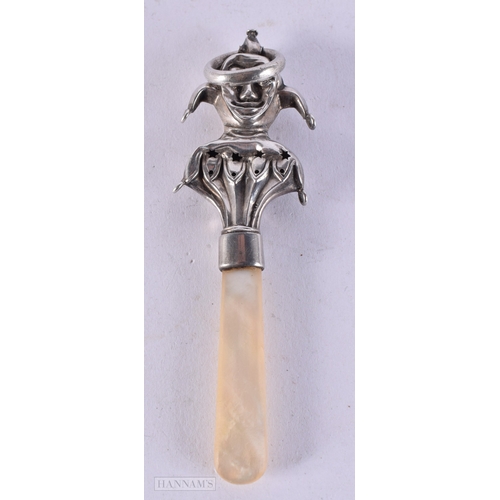 415 - AN ANTIQUE ENGLISH SILVER AND MOTHER OF PEARL JESTER BABIES RATTLE. 11.5 cm long.