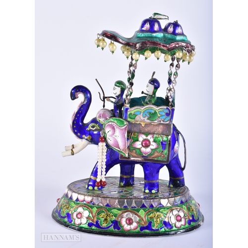 453 - AN INDIAN SILVER AND ENAMEL ELEPHANT GROUP. 721 grams overall. 21 cm x 12cm.