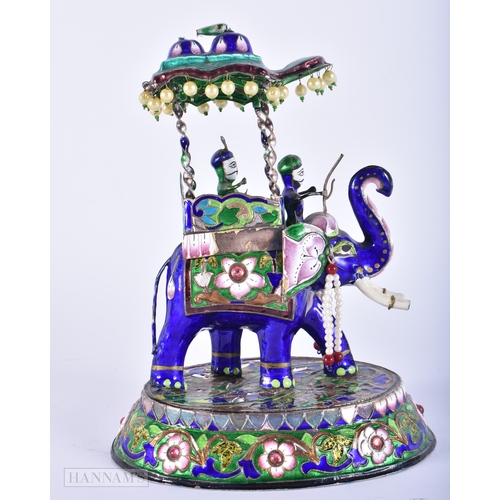 453 - AN INDIAN SILVER AND ENAMEL ELEPHANT GROUP. 721 grams overall. 21 cm x 12cm.