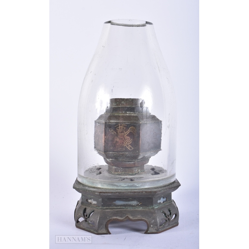 481 - A JAPANESE OIL LAMP with reticulated base. 17 cm high.