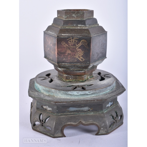 481 - A JAPANESE OIL LAMP with reticulated base. 17 cm high.