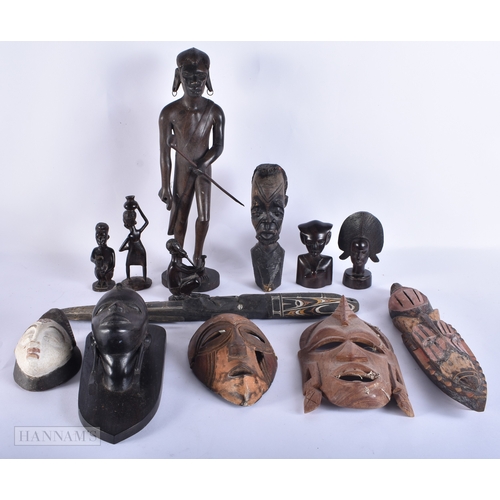 99 - A COLLECTION OF TRIBAL CARVED WOOD FIGURES. (qty)