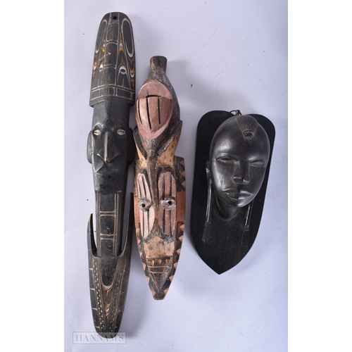 99 - A COLLECTION OF TRIBAL CARVED WOOD FIGURES. (qty)