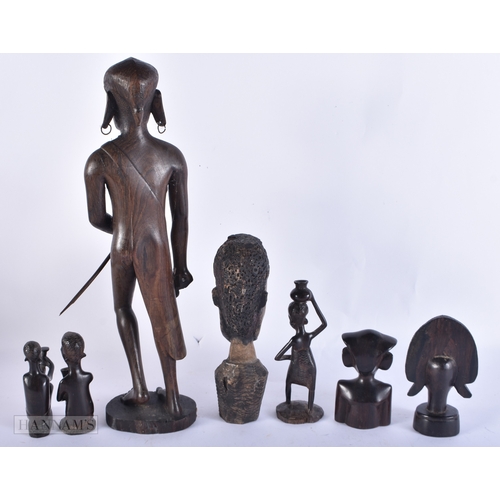 99 - A COLLECTION OF TRIBAL CARVED WOOD FIGURES. (qty)