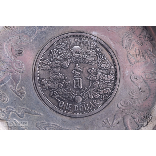 1788 - A PAIR OF CHINESE WHITE METAL COIN DISHES. 221.5 grams. 9.25cm diameter.