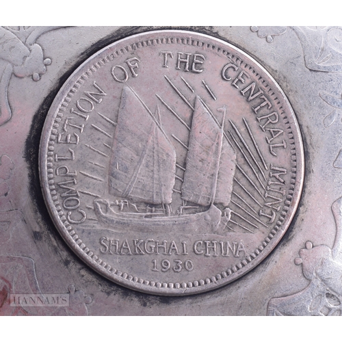 1788 - A PAIR OF CHINESE WHITE METAL COIN DISHES. 221.5 grams. 9.25cm diameter.