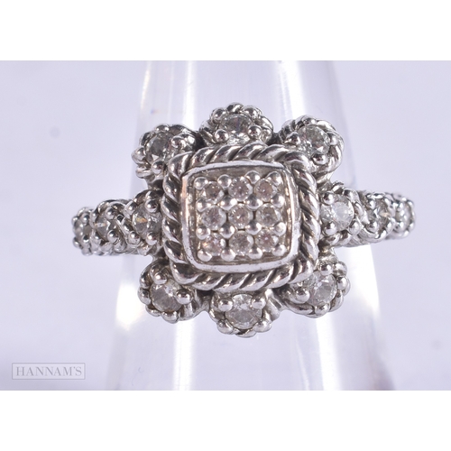 1838 - A JUDITH RIPKA SILVER AND DIAMOND RING. N. 8.5 grams.