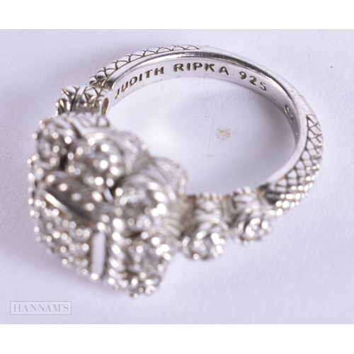 1838 - A JUDITH RIPKA SILVER AND DIAMOND RING. N. 8.5 grams.