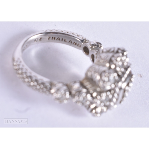 1838 - A JUDITH RIPKA SILVER AND DIAMOND RING. N. 8.5 grams.