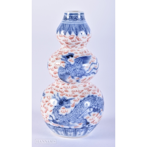 2004 - A FINE 19TH CENTURY CHINESE TRIPLE GOURD PORCELAIN SNUFF BOTTLE Qing, painted with dragons and phoen... 