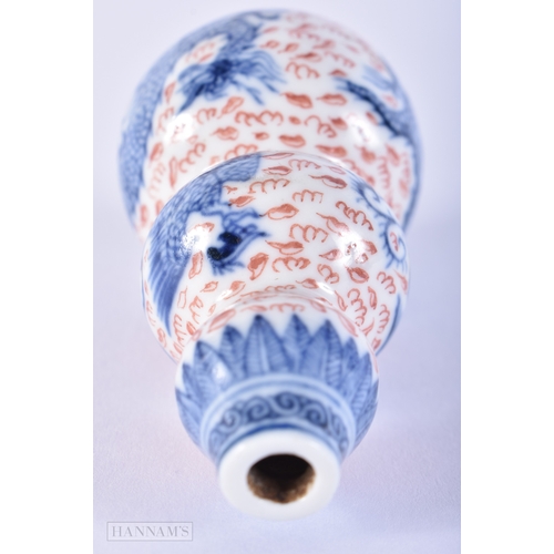 2004 - A FINE 19TH CENTURY CHINESE TRIPLE GOURD PORCELAIN SNUFF BOTTLE Qing, painted with dragons and phoen... 