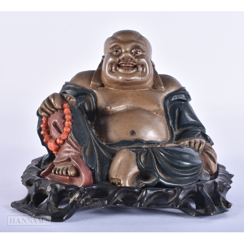 2007 - AN UNUSUAL LATE 19TH CENTURY CHINESE LACQUERED FIGURE OF A BUDDHA Late Qing. 14 cm x 12cm.