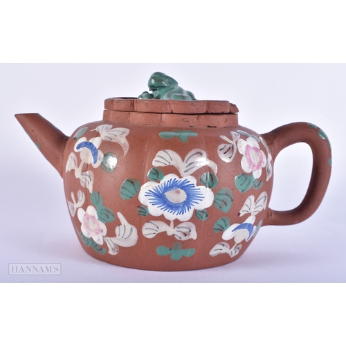 2012 - A 19TH CENTURY CHINESE YIXING POTTERY ENAMELLED TEAPOT AND COVER Late Qing. 16 cm wide.