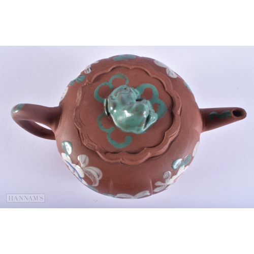 2012 - A 19TH CENTURY CHINESE YIXING POTTERY ENAMELLED TEAPOT AND COVER Late Qing. 16 cm wide.