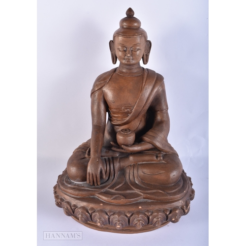 2022 - AN UNUSUAL 19TH CENTURY CHINESE TIBETAN TERRACOTTA YIXING BUDDHA Qing. 35 cm x 22 cm.