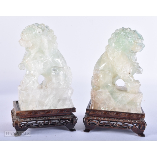 2049 - A PAIR OF LATE 19TH CENTURY CHINESE CARVED FLUORITE BUDDHIST LIONS Late Qing. 16 cm high.