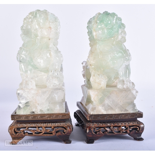 2049 - A PAIR OF LATE 19TH CENTURY CHINESE CARVED FLUORITE BUDDHIST LIONS Late Qing. 16 cm high.