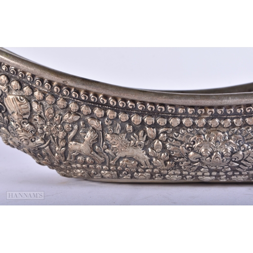 2053 - Indonesian Yogya, Djokja Bread Basket with animal figures, 1890. 35 cm wide.