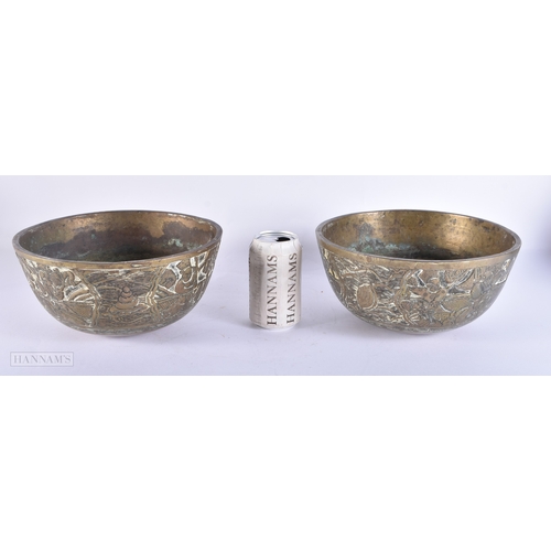 2054 - A LARGE PAIR OF 19TH CENTURY CHINESE BRONZE BOWLS bearing Xuande marks to base. 24 cm diameter.