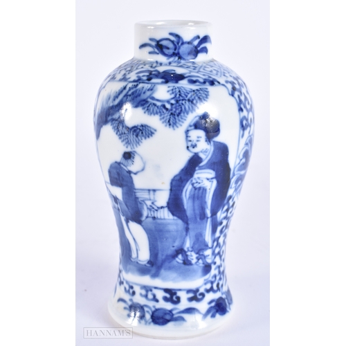 2061 - A 19TH CENTURY CHINESE BLUE AND WHITE PORCELAIN VASE bearing Kangxi marks to base. 13 cm high.