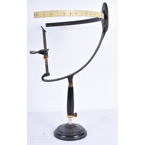 A vintage Optometry Arc Perimeter machines 44 x 40 cm