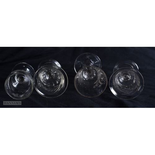 100 - FOUR ANTIQUE GLASSES one engraved with a motto and  birds. Largest 13 cm high. (4)