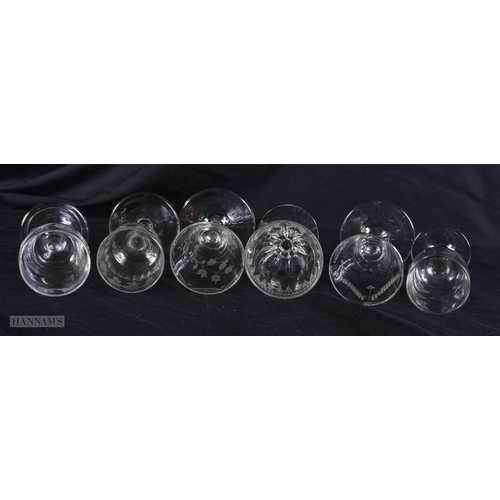 101 - SIX ANTIQUE GLASSES all engraved with flowers. 12 cm high. (6)