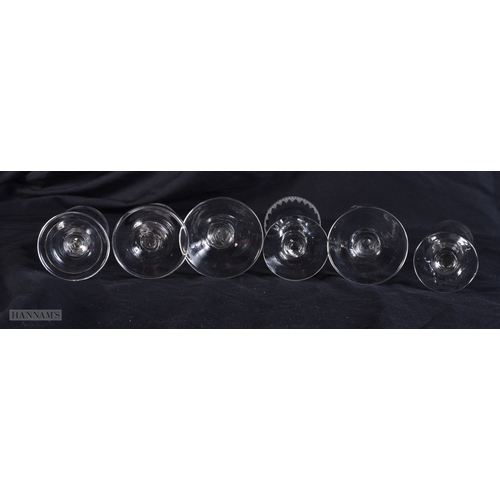 101 - SIX ANTIQUE GLASSES all engraved with flowers. 12 cm high. (6)