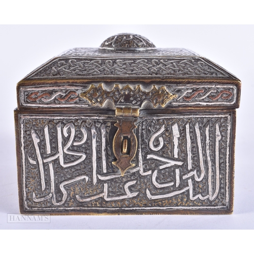 114 - A RARE 19TH CENTURY ISLAMIC MIDDLE EASTERN SILVER INLAID BRONZE BOX decorated with scripture. 10 cm ... 