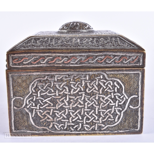 114 - A RARE 19TH CENTURY ISLAMIC MIDDLE EASTERN SILVER INLAID BRONZE BOX decorated with scripture. 10 cm ... 