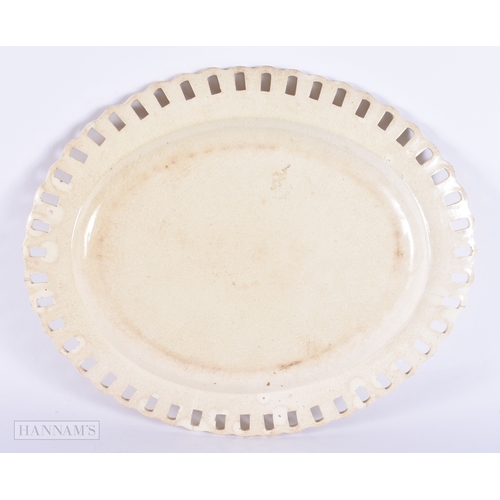 116 - A LATE 18TH/19TH CENTURY ENGLISH CREAMWARE RETICULATED LATTICE DISH. 28 cm x 23 cm.