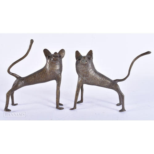 117 - A PAIR OF ANTIQUE AFRICAN BRONZE WOLVES. 15 cm wide.