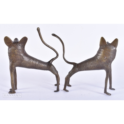 117 - A PAIR OF ANTIQUE AFRICAN BRONZE WOLVES. 15 cm wide.
