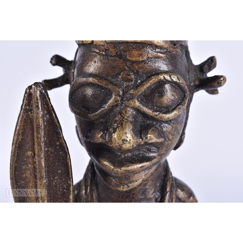 119 - A PAIR OF 19TH CENTURY AFRICAN BENIN BRONZE TRIBAL FIGURES. 21 cm high.