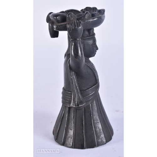 121 - A RARE 18TH/19TH CENTURY INDIAN CARVED STONE DEITY modelled holding aloft a basket inset with a figu... 