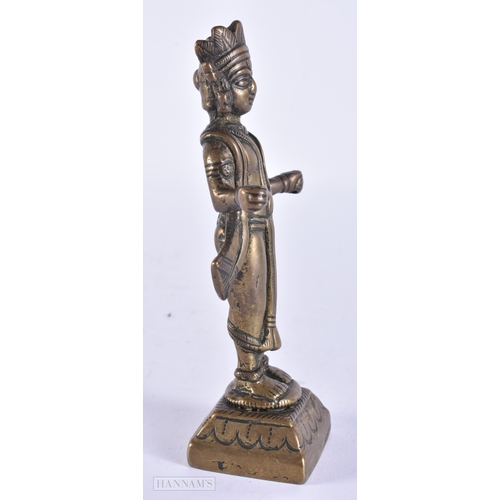 122 - AN 18TH CENTURY INDIAN HINDU BRONZE DEITY. 14 cm high.