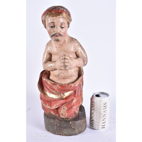 130 - AN UNUSUAL 17TH/18TH CENTURY EUROPEAN PAINTED WOOD FIGURE OF A MALE possibly representing an Eastern... 