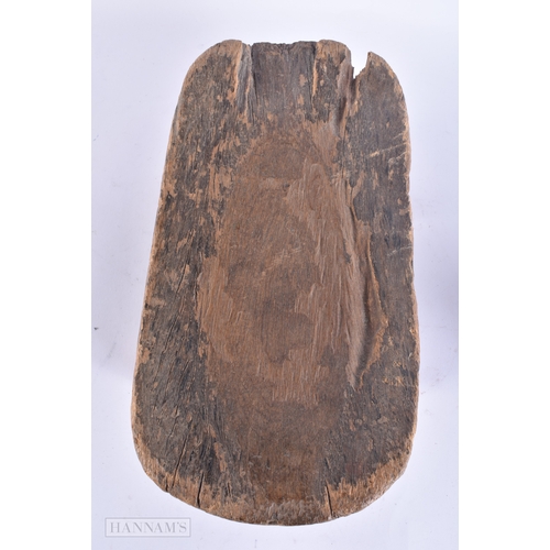 131 - AN ANTIQUE AFRICAN TRIBAL WOOD HEADREST. 34 cm x 18 cm.