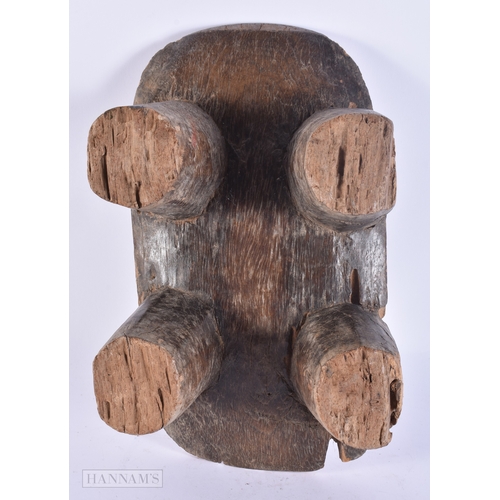 131 - AN ANTIQUE AFRICAN TRIBAL WOOD HEADREST. 34 cm x 18 cm.