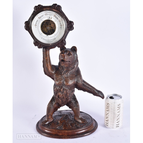 132 - A RARE 19TH CENTURY BAVARIAN BLACK FOREST CARVED WOOD BAROMETER formed as a standing bear. 42 cm x 1... 